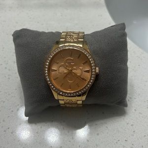 Rose gold guess watch